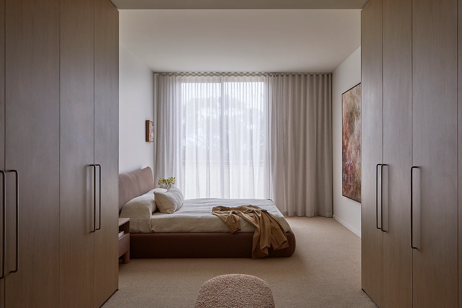 Sandringham Residences - Primary bedroom with floor-to-ceiling timber wardrobes